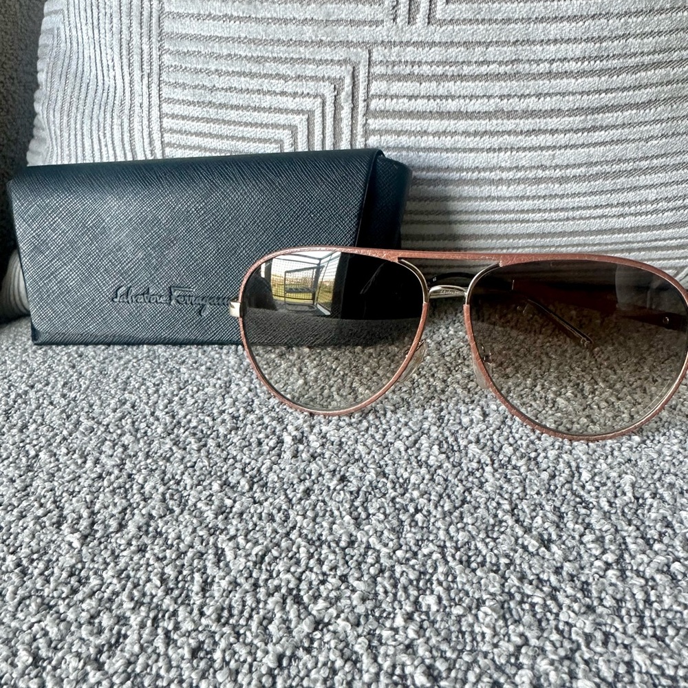 Salvatore Ferragamo Camel Leather Aviator Sunglasses comes with case.